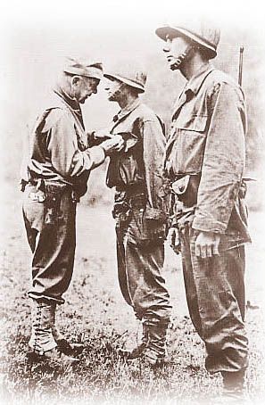 A young Ben Carpenter receives the Silver Star Medal for bravery in battle.